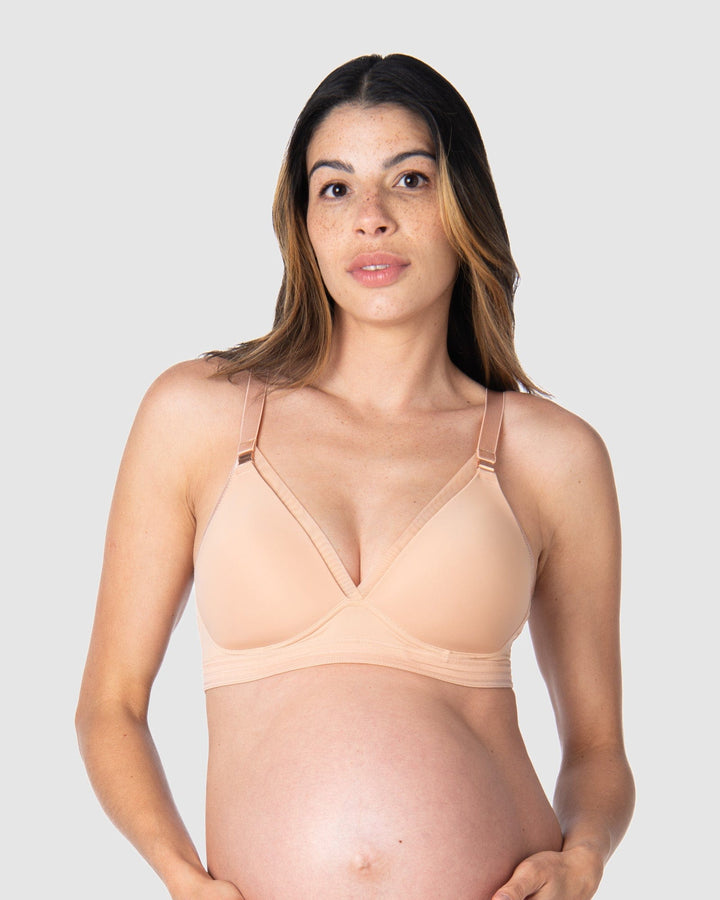 Premium Photo  Nursing bra it prevents milk from getting on clothes it is  convenient to unfasten cups for feeding the baby photo of a young mom on a  pink background the
